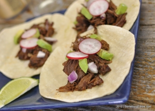 Putting the Barbeque back in Barbacoa: Mesquite-Smoked, Beer-Braised Barbacoa-Style Chuck Roast.